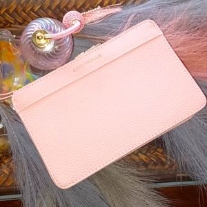 Coccinelle Pink Wrislet/Mini Bag